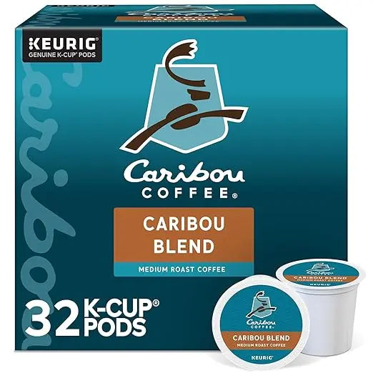 Box of Caribou Coffee K-Cup pods with a teal background