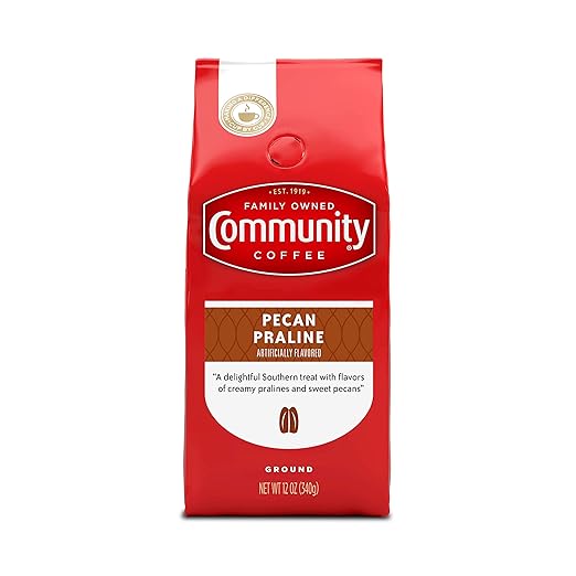 Red bag of Community Coffee Pecan Praline on a white background