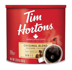 Red can of Tim Hortons Original Blend ground coffee with a white label.