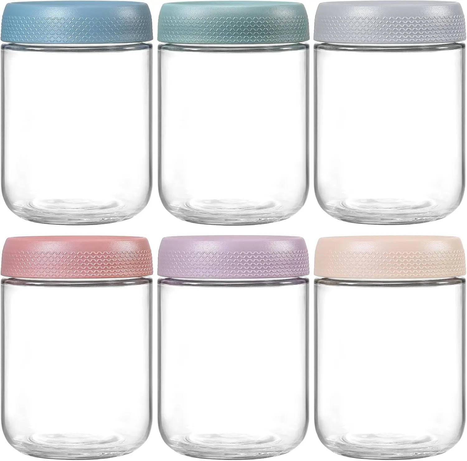 Set of six clear glass jars with colorful lids on a white background