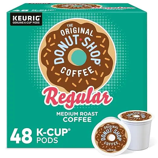 Box of The Original Donut Shop Coffee K-Cup pods with teal background