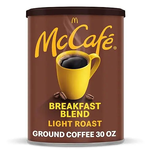 McCafe Breakfast Blend light roast coffee can with yellow cup and text on brown background