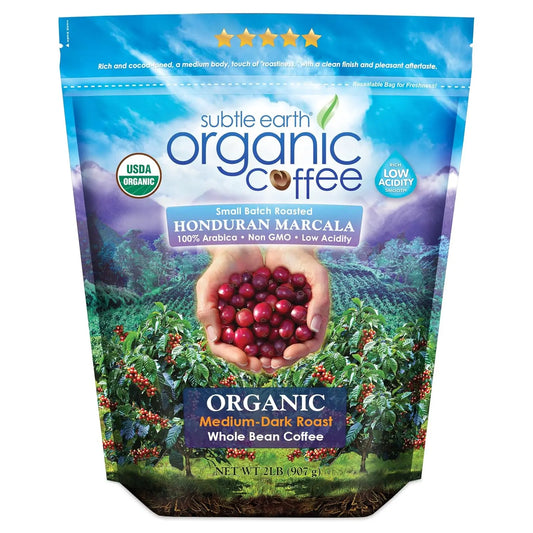 Subtle Earth Organic Coffee package with coffee beans and coffee plant imagery on a scenic background